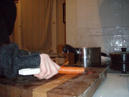 One-handed carrot peeling, and I didn't peel my thumb!